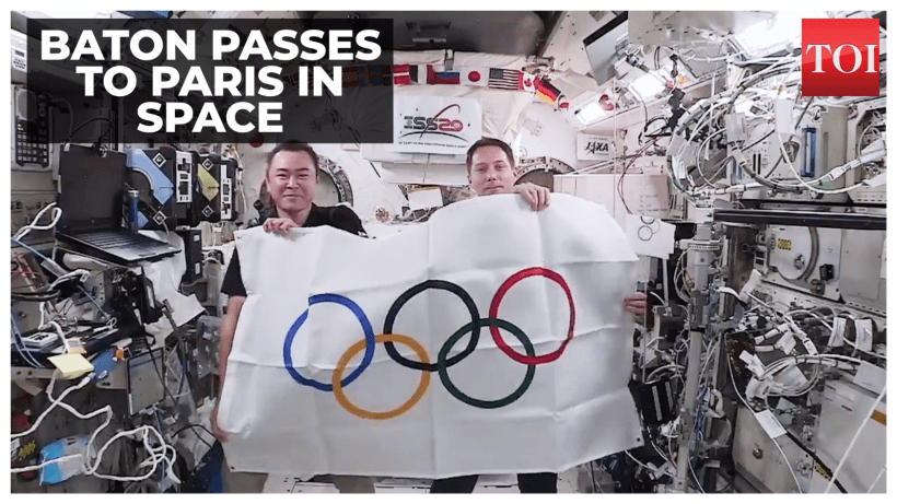 Olympic Baton passed in space by Japanese and French astronaut